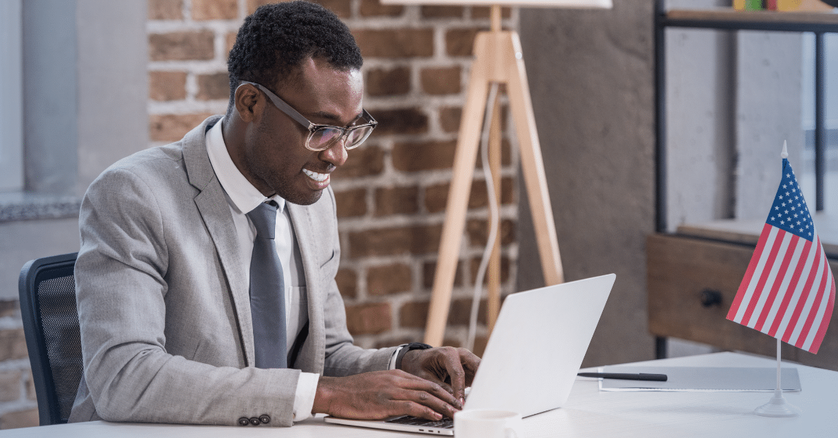 Businessman typing on a laptop