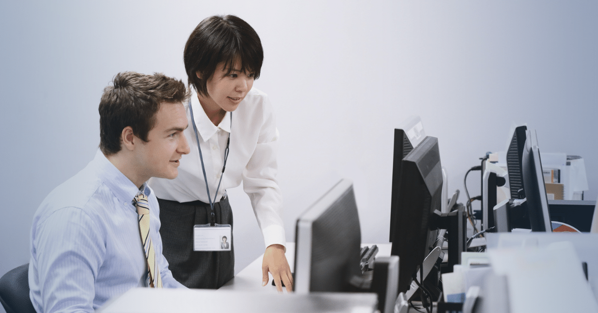 People collaborating on a computer