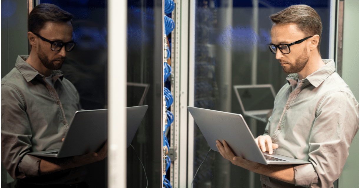 Man typing on a computer